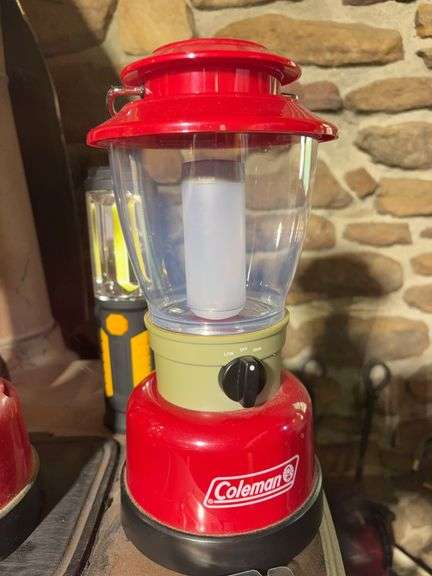 (3) matching Coleman lanterns, Dorcy lantern, and (2) flashlights