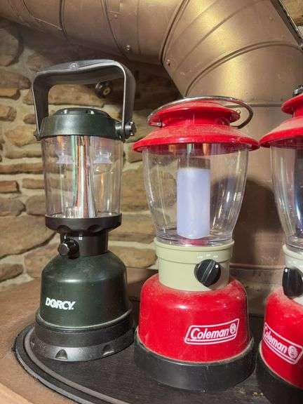 (3) matching Coleman lanterns, Dorcy lantern, and (2) flashlights