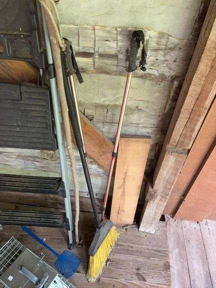 Step ladder, live animal trap, broom, and walking sticks
