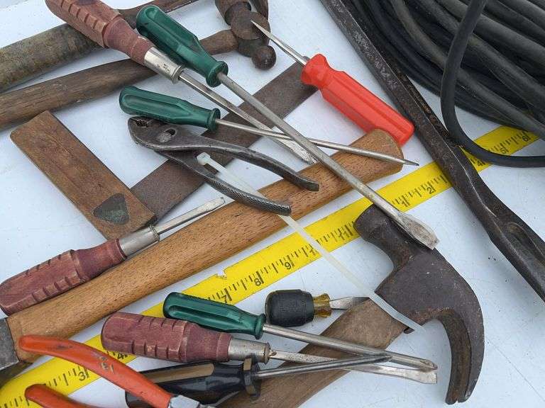 Bucket with Extension Cord and Handtools