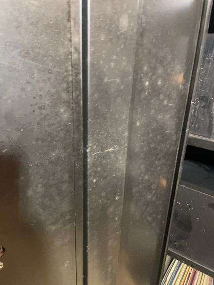 Black metal storage cabinet - contents NOT included