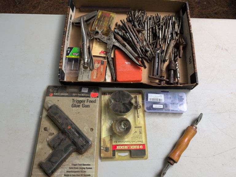 Glue gun, drill bits, clamp, and other tools