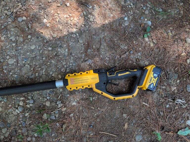 DeWalt brushless extended chain saw with battery