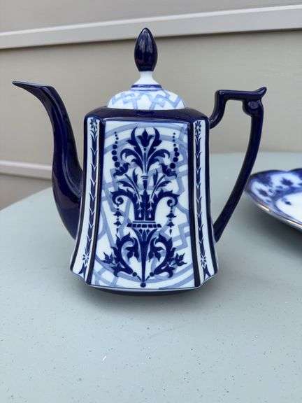 Blue and White Patterned Tea Pot w/ Sugar and Creamer, (2) Tea Cups w/ (2) Plates, and Serving Dish