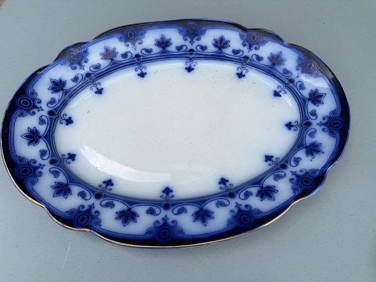 Blue and White Patterned Tea Pot w/ Sugar and Creamer, (2) Tea Cups w/ (2) Plates, and Serving Dish