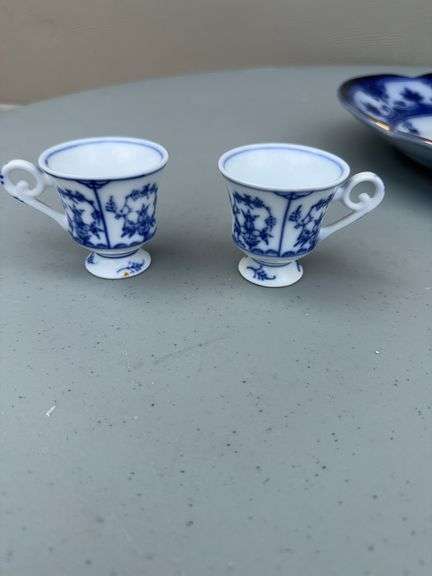 Blue and White Patterned Tea Pot w/ Sugar and Creamer, (2) Tea Cups w/ (2) Plates, and Serving Dish