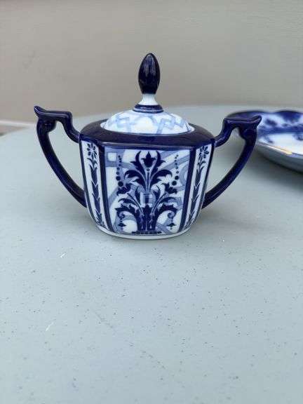Blue and White Patterned Tea Pot w/ Sugar and Creamer, (2) Tea Cups w/ (2) Plates, and Serving Dish