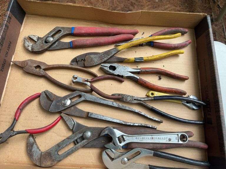 Flat of wrenches, pliers, snips, and other hand tools