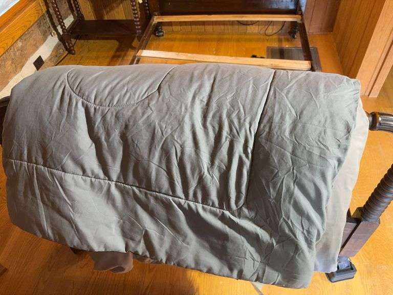 Twin bed frame with matching nightstand and comforter