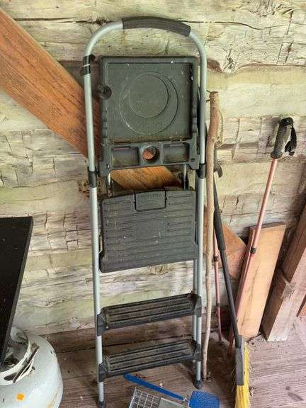 Step ladder, live animal trap, broom, and walking sticks