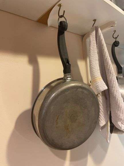 Lot of pots and pans including Farberware and revereware