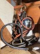 Reflective vest, paint sprayer, construction stand