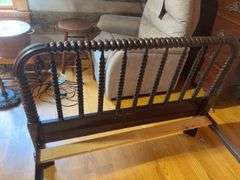 Twin bed frame with matching nightstand and comforter