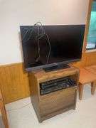 Wooden rolling stand with 40" Sony TV and DVD player and recorder