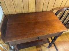 Twin bed frame with matching nightstand and comforter