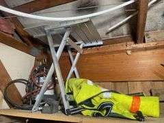 Reflective vest, paint sprayer, construction stand