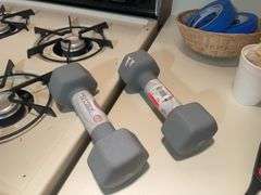 Cooking utensils, dumbbells, and other items