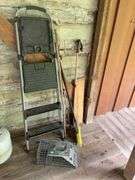Step ladder, live animal trap, broom, and walking sticks