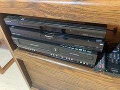 Wooden rolling stand with 40" Sony TV and DVD player and recorder