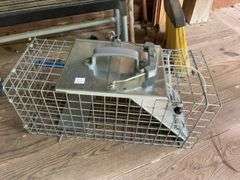 Step ladder, live animal trap, broom, and walking sticks