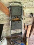 Step ladder, live animal trap, broom, and walking sticks
