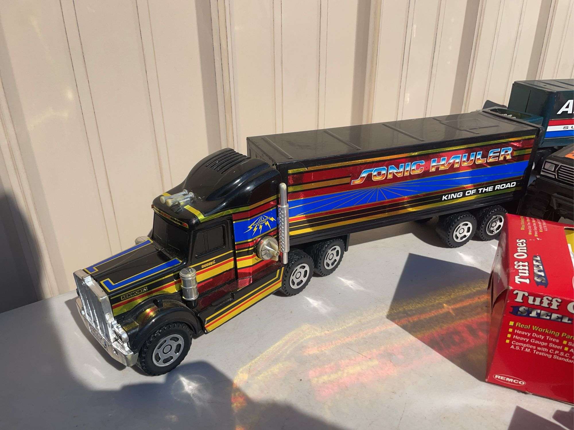 Box of toy cars/ trucks