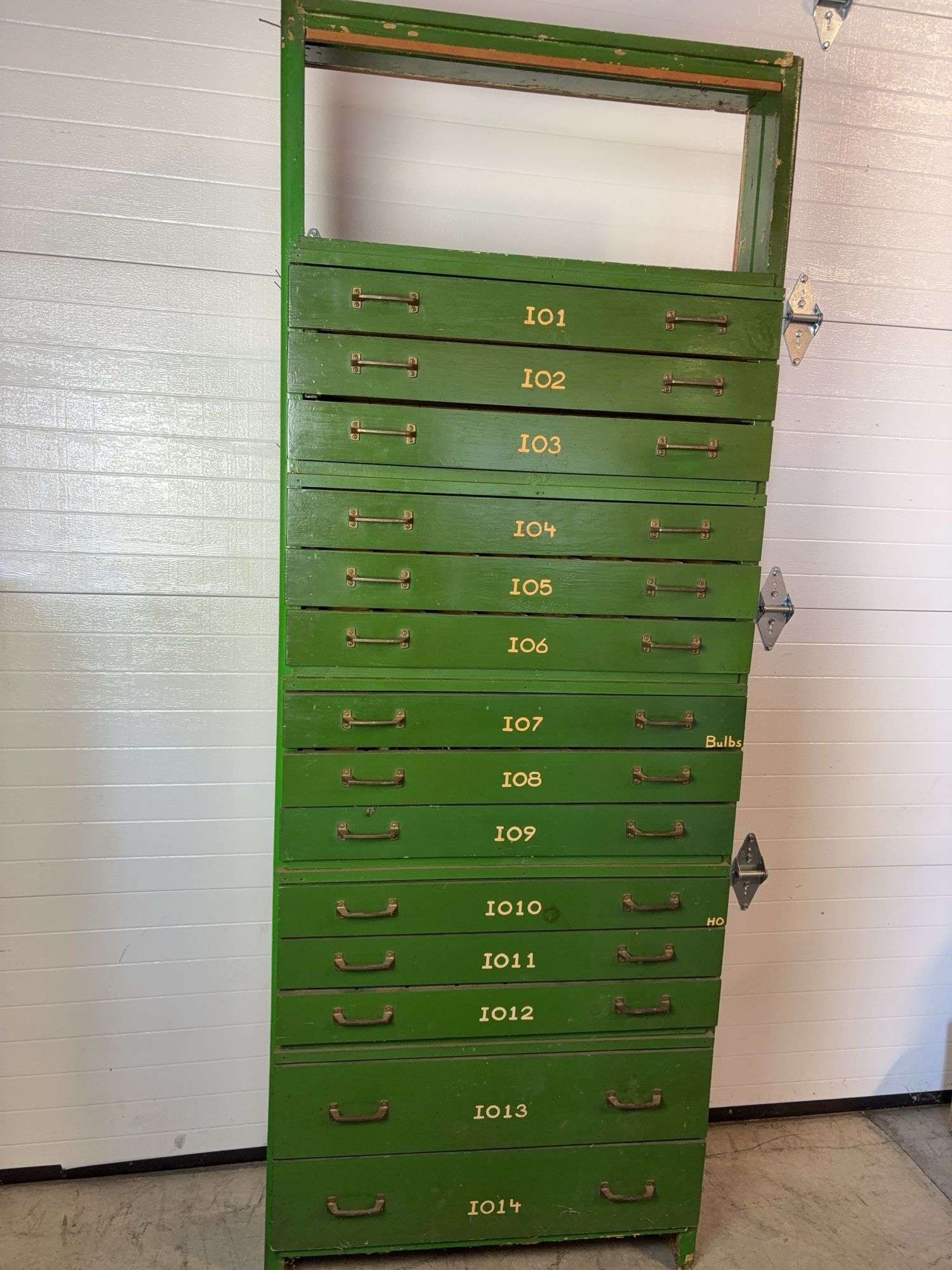 Green organizational stand - 32" wide, 8" deep, and 84" tall