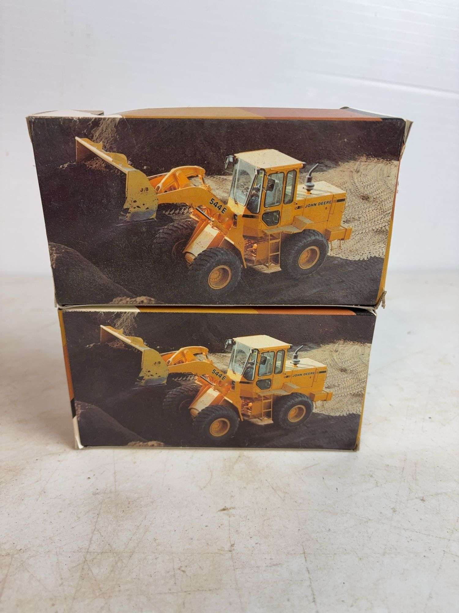 (2) John Deere 544E model wheel loader - 1/64 scale, dirty