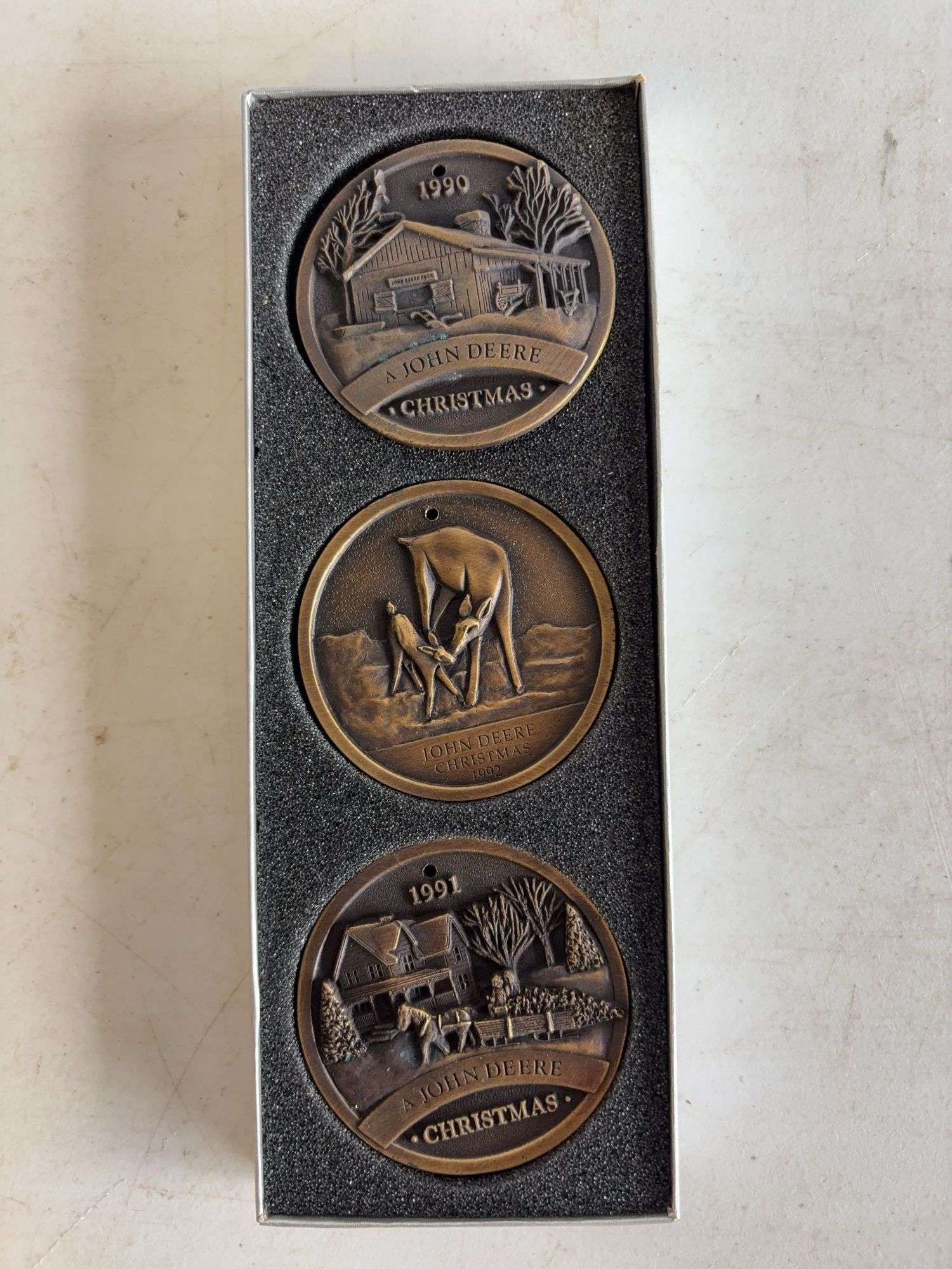 (3) John Deere brass Christmas coins