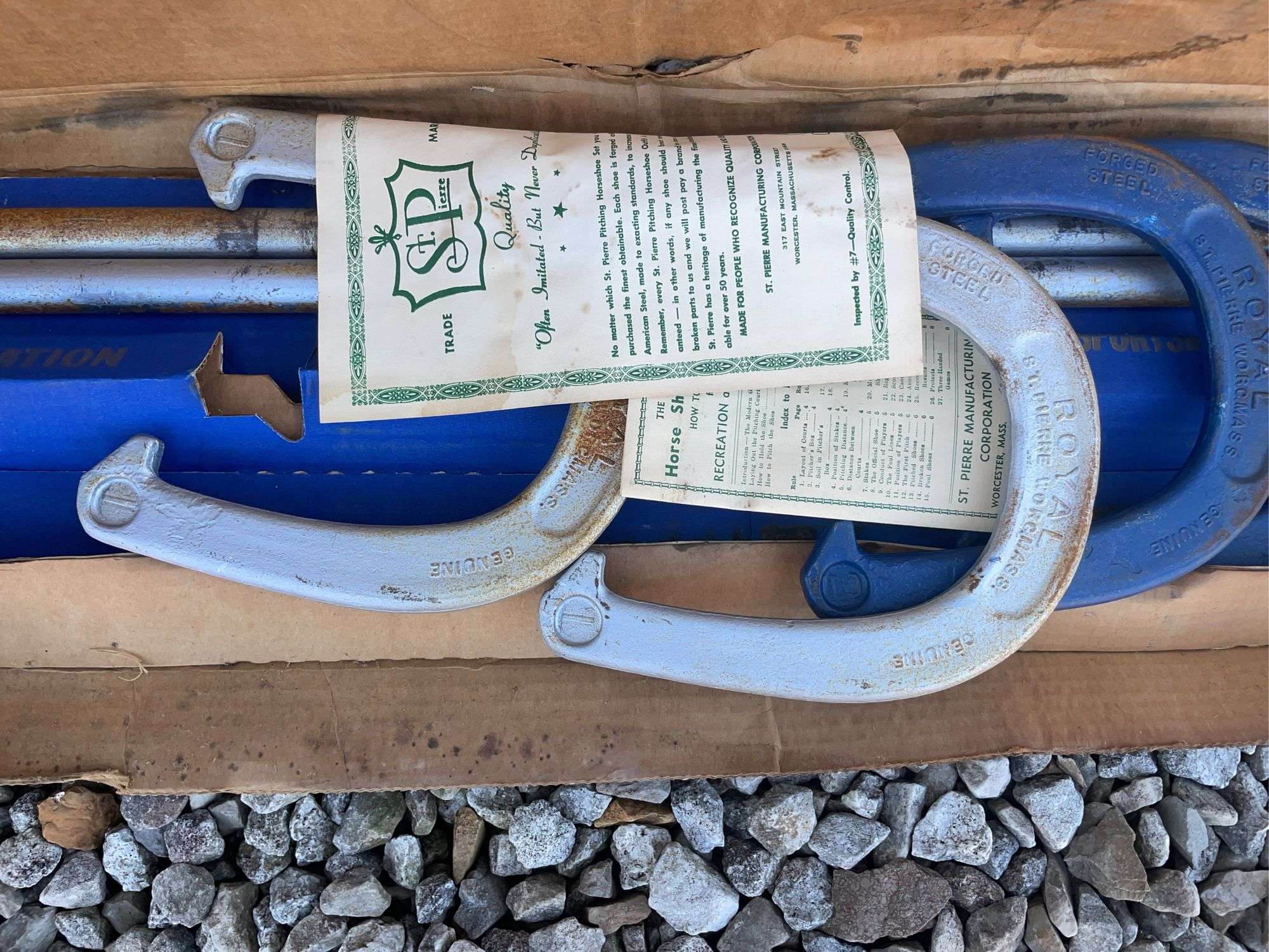 Golf bag with misc. clubs, skis and horseshoe game