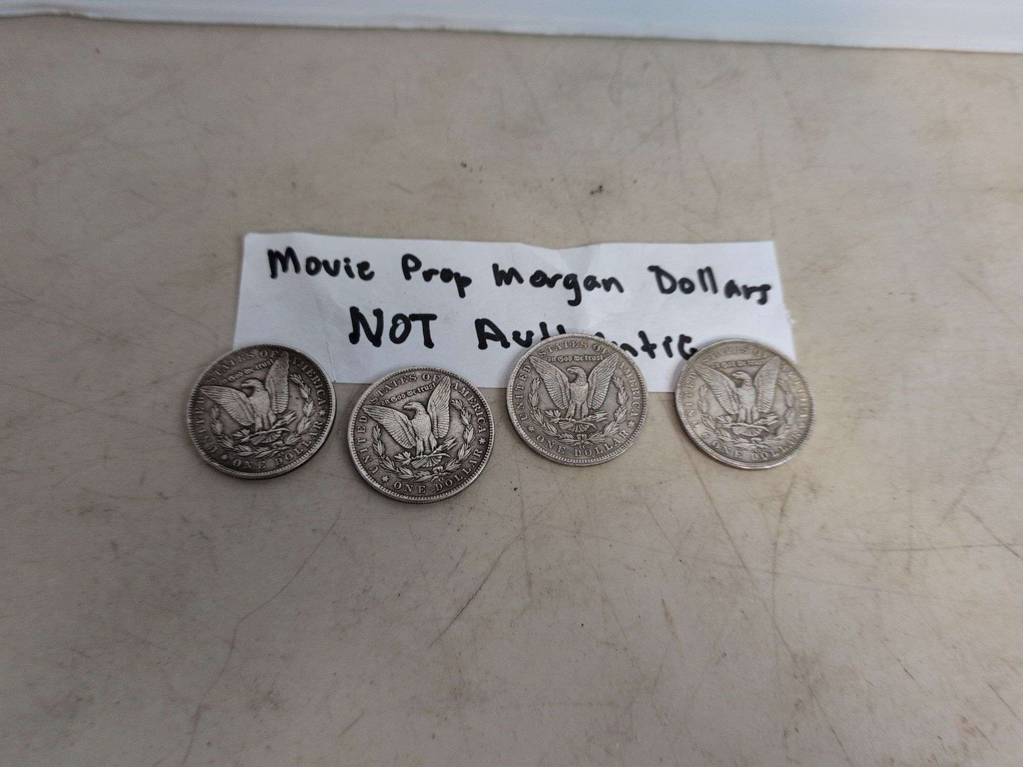 (4) movie prop Morgan Dollars - not authentic