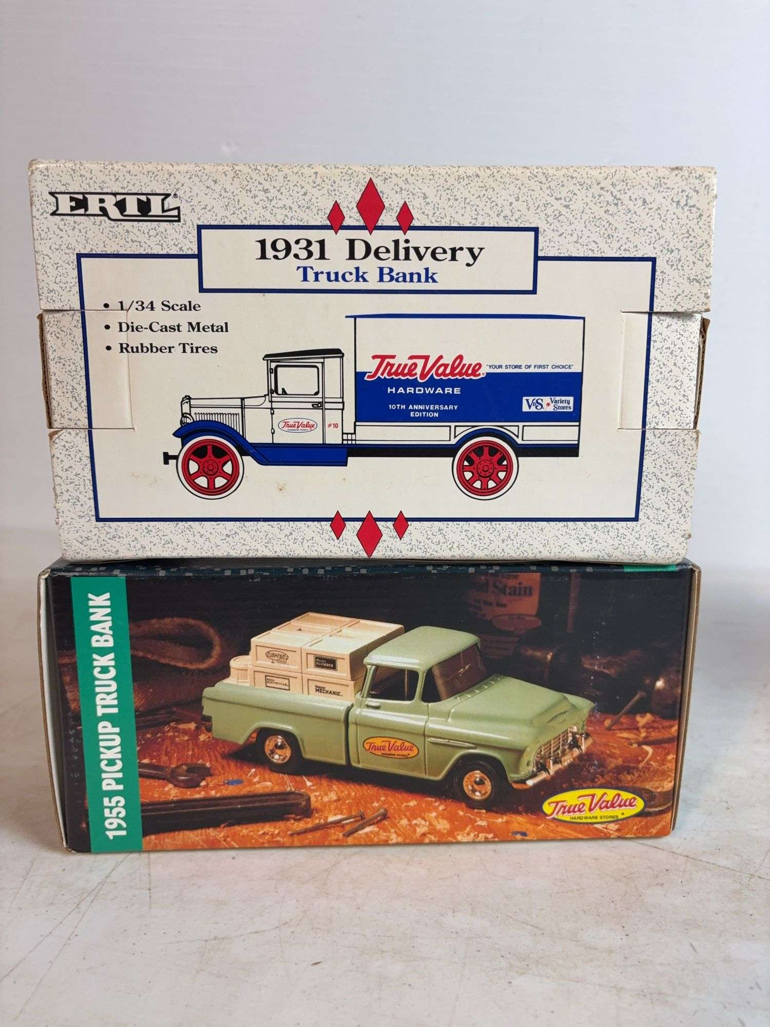 (2) True Value model truck banks - 1/25 and 1/34 scale, dirty