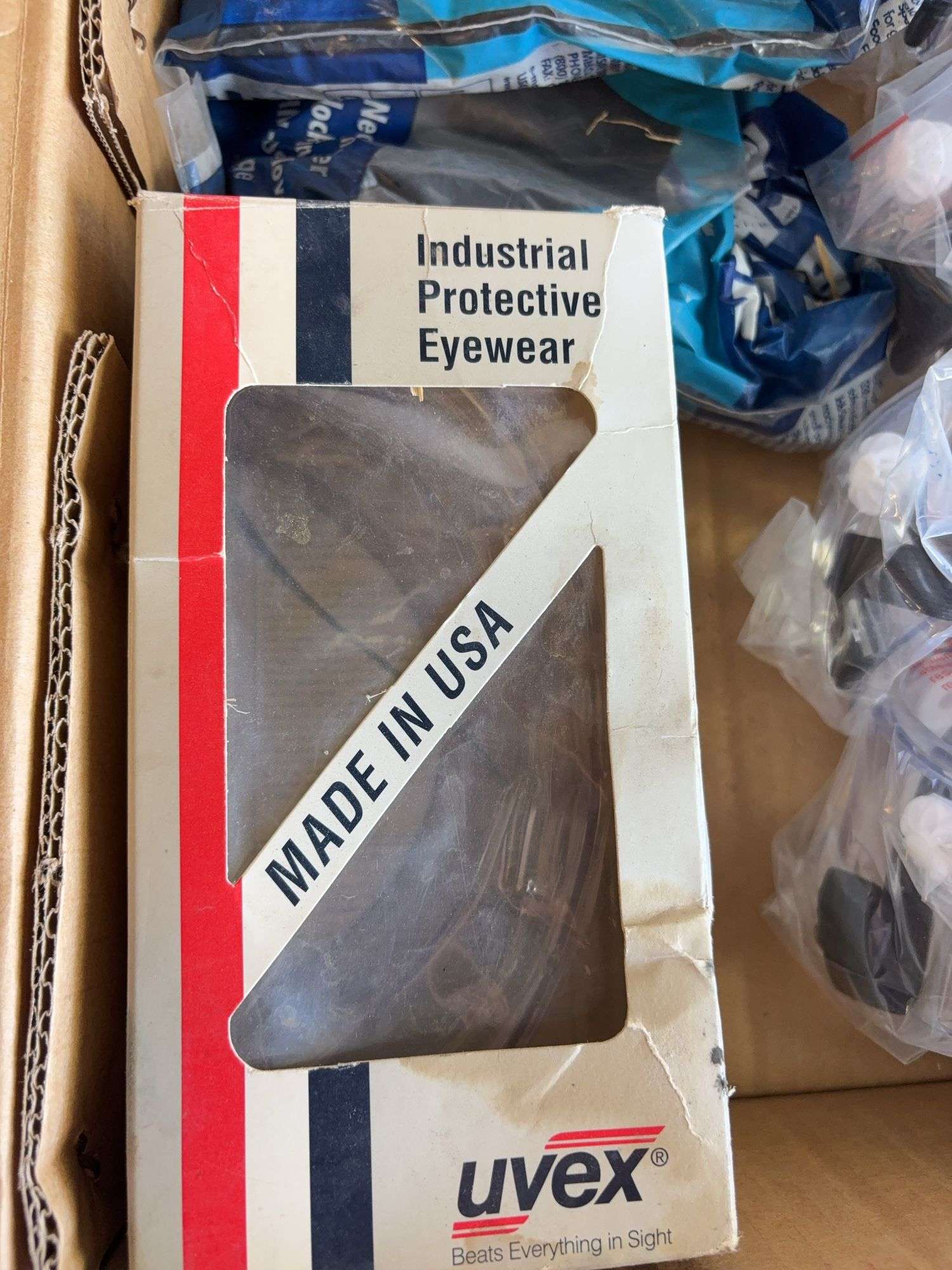 Anvil/bench vise and safety goggles