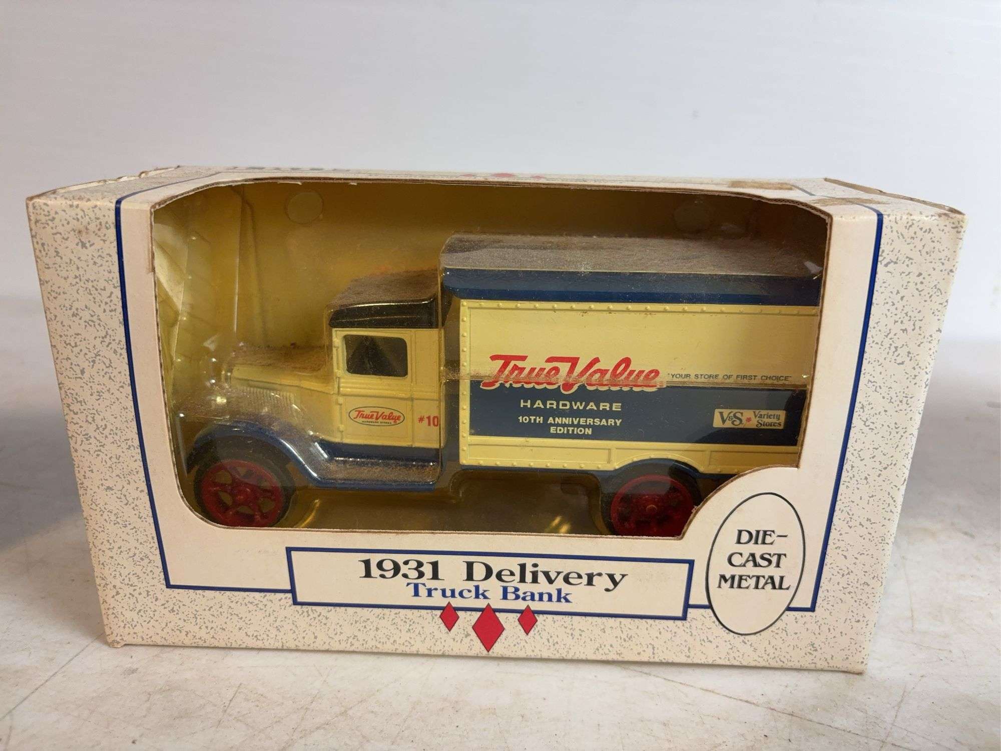 (2) True Value model truck banks - 1/25 and 1/34 scale, dirty