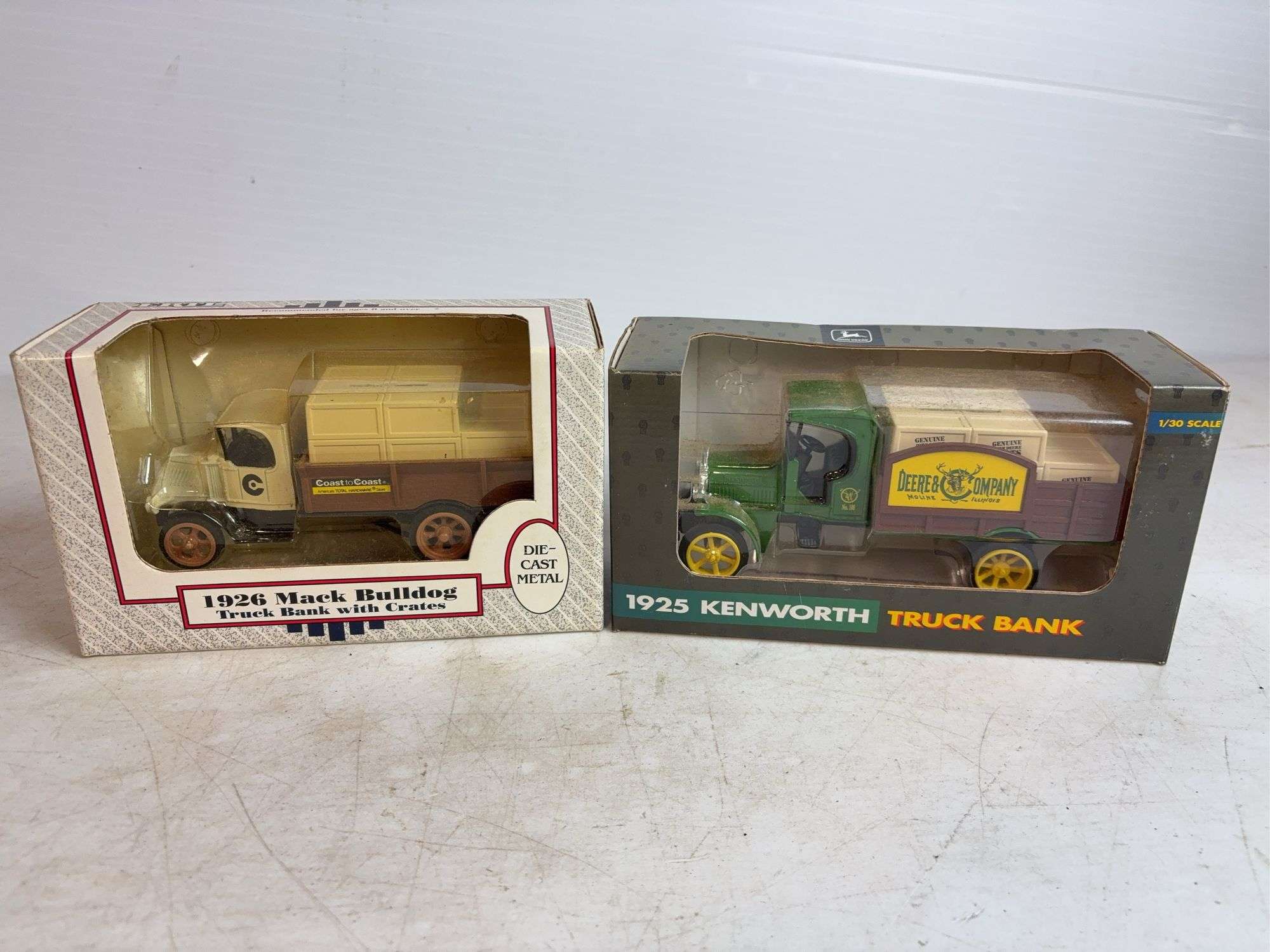 (2) model truck banks - Deere & Company - 1/30 scale & Mack Bulldog - 1/38 scale