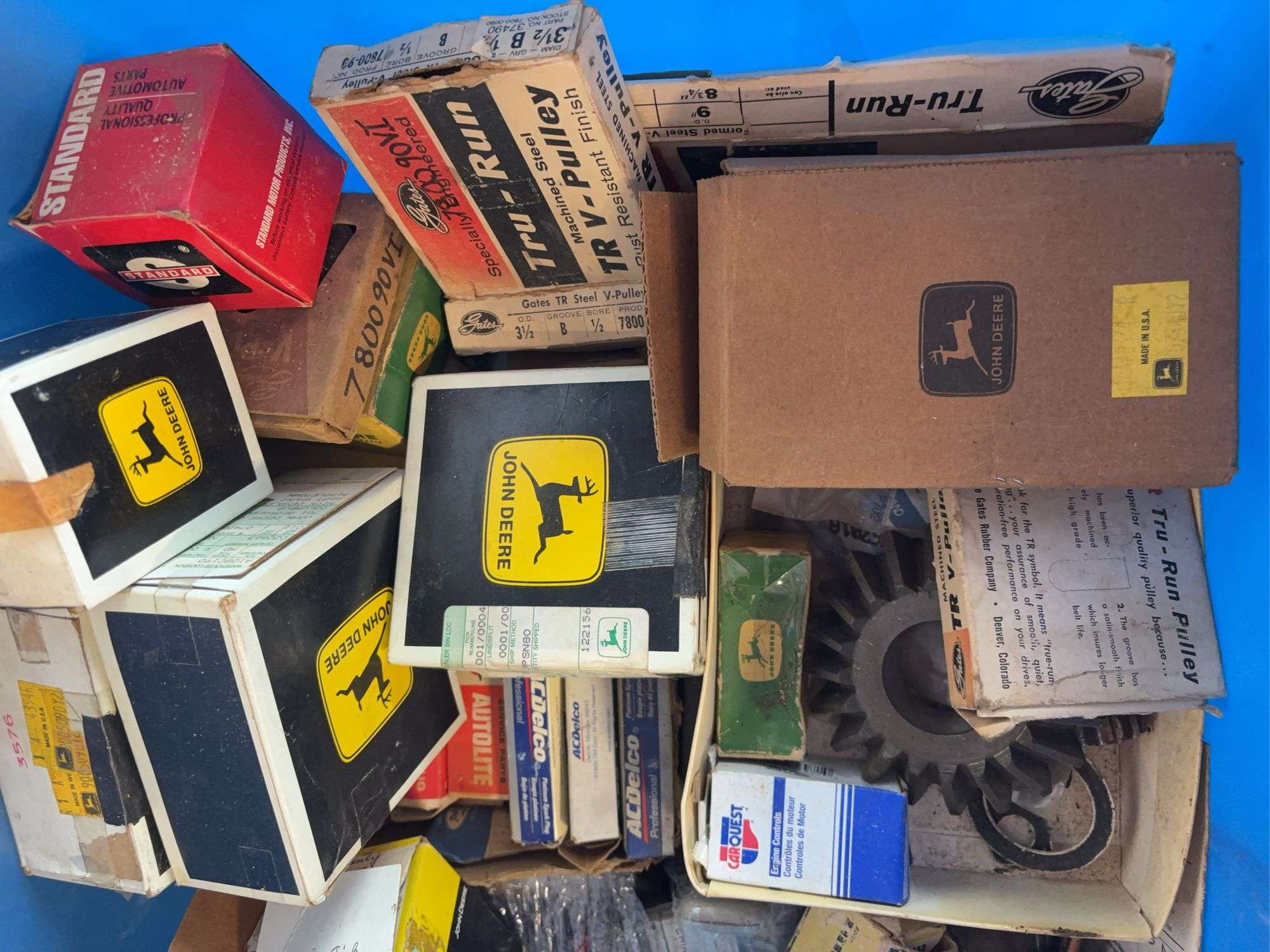 Tote of filters, parts, and more - John Deere, Wix, etc