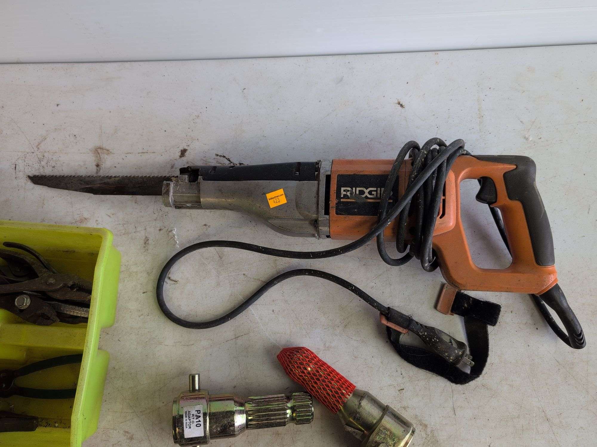 Ridgid sawzall, crow bar, pliers, and other hand tools