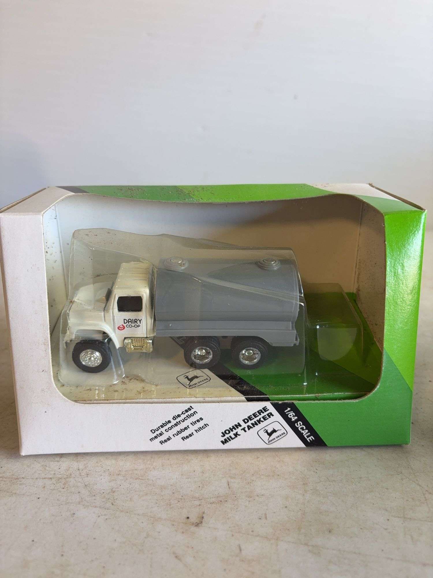 John Deere model milk tanker & John Deere model implement hauling flatbed - 1/64 scale, dirty