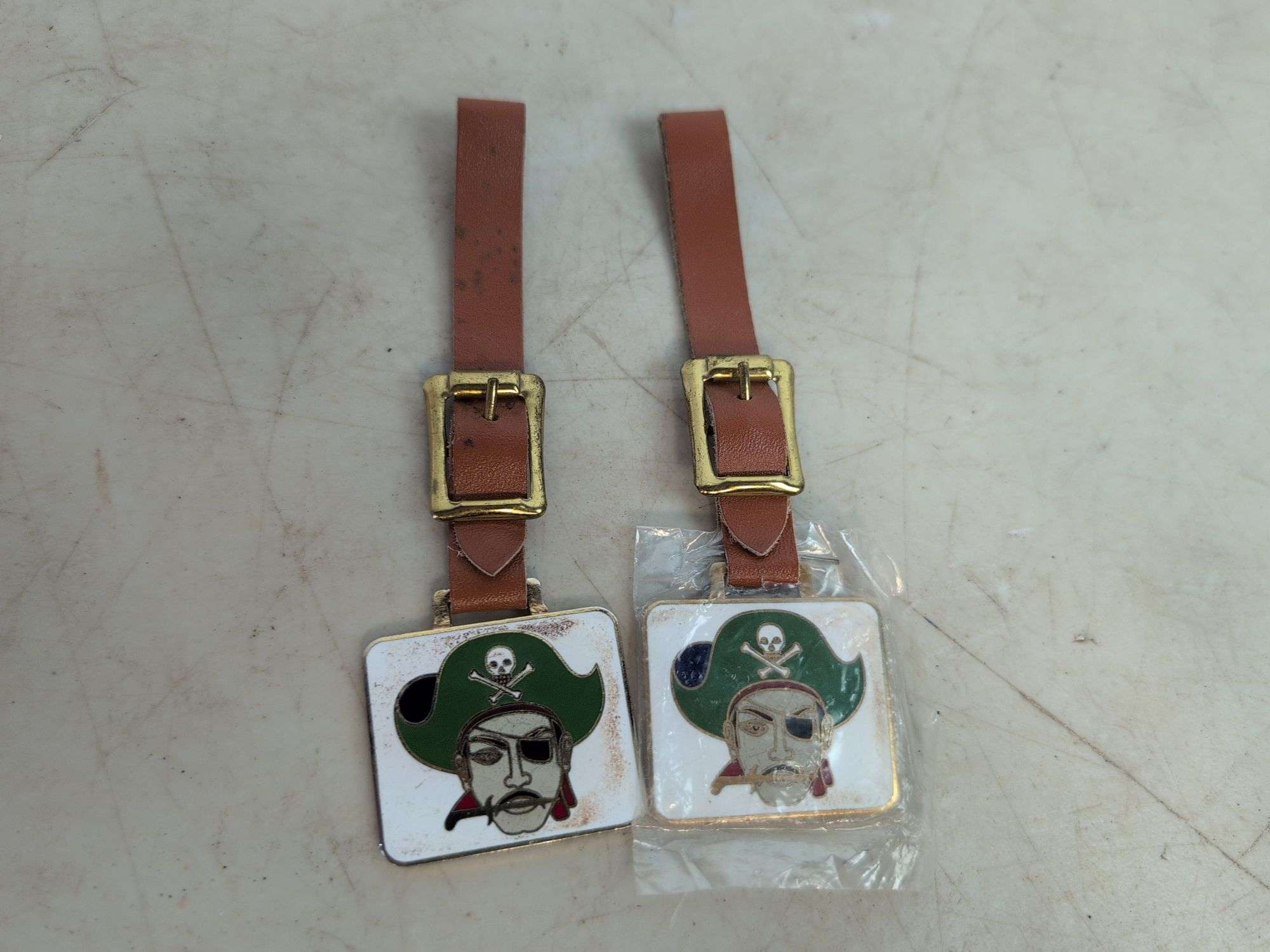 (2) 1976 Garaway Booster Club watch fobs