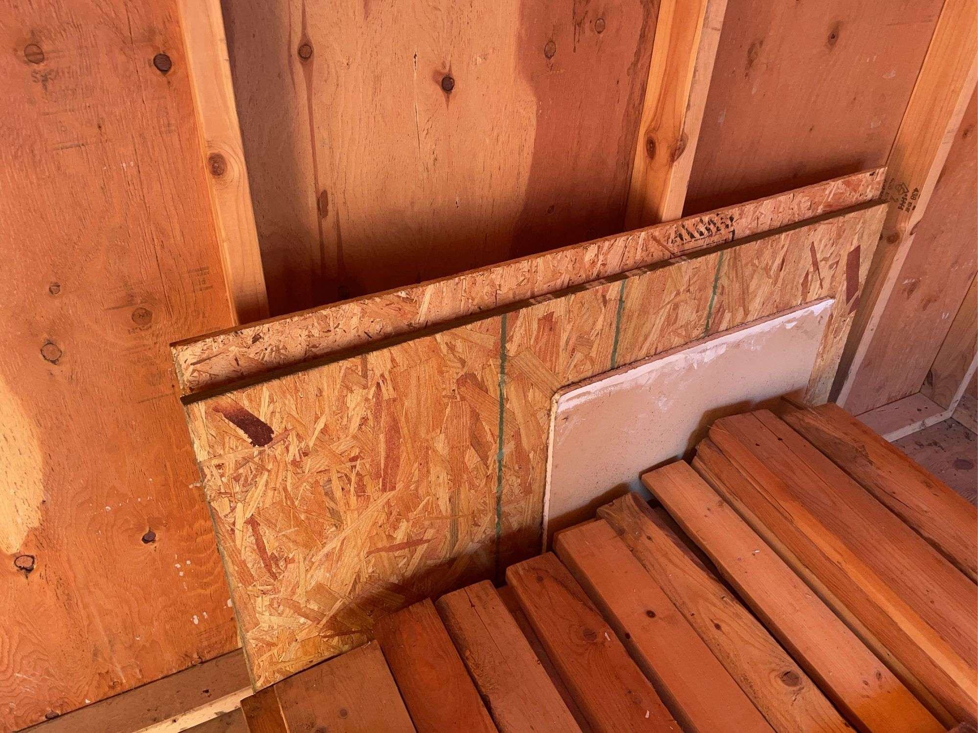 Large pile of wood and misc. tile flooring