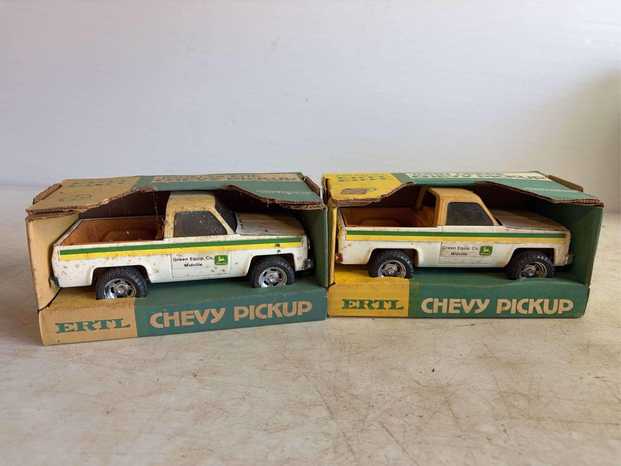 (2) John Deere model Chevy pickups - dirty