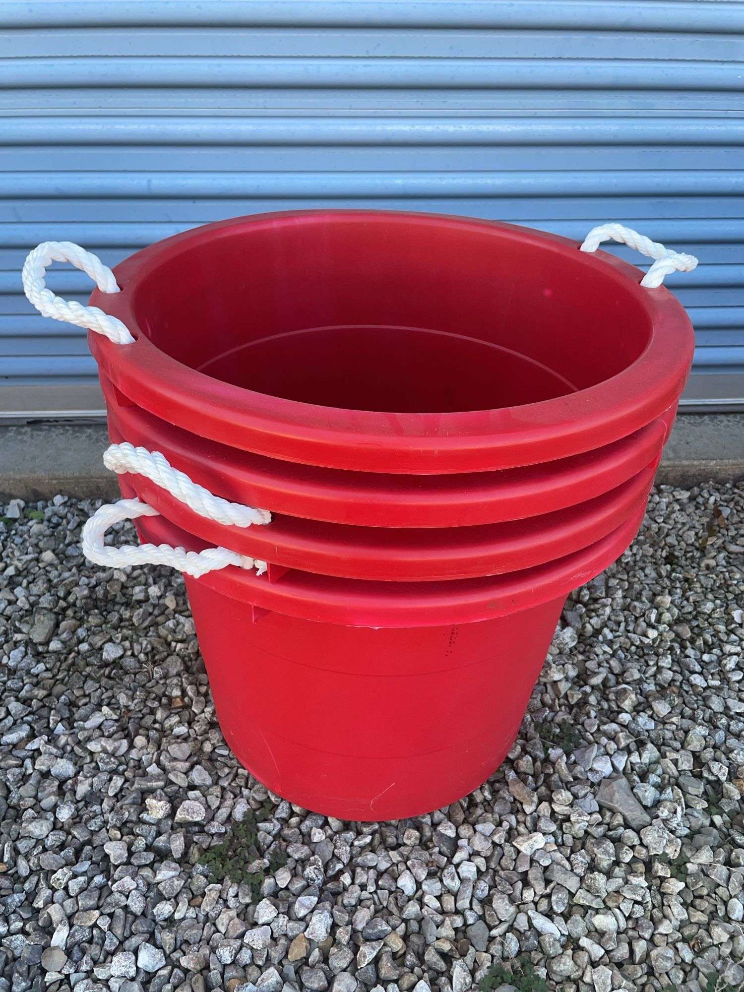 (4) red plastic tubs