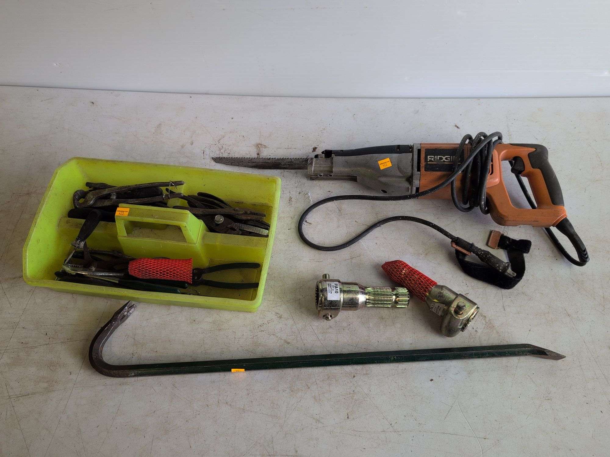 Ridgid sawzall, crow bar, pliers, and other hand tools