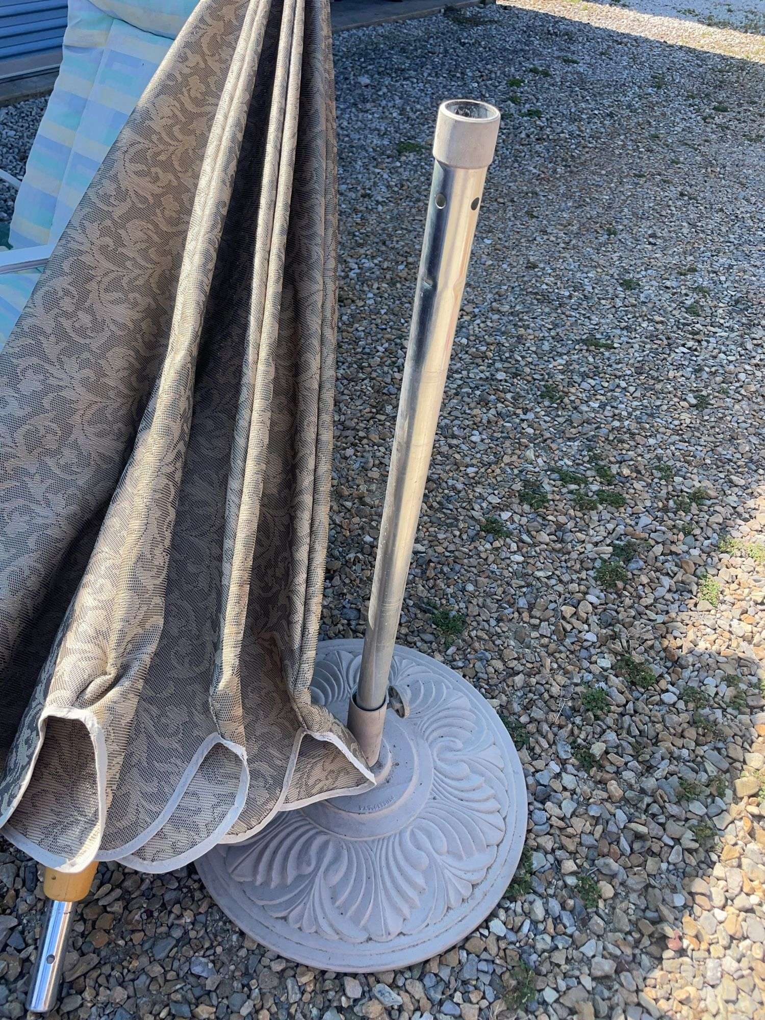 Umbrella stand w/ umbrella, outdoor chair and extra cushion