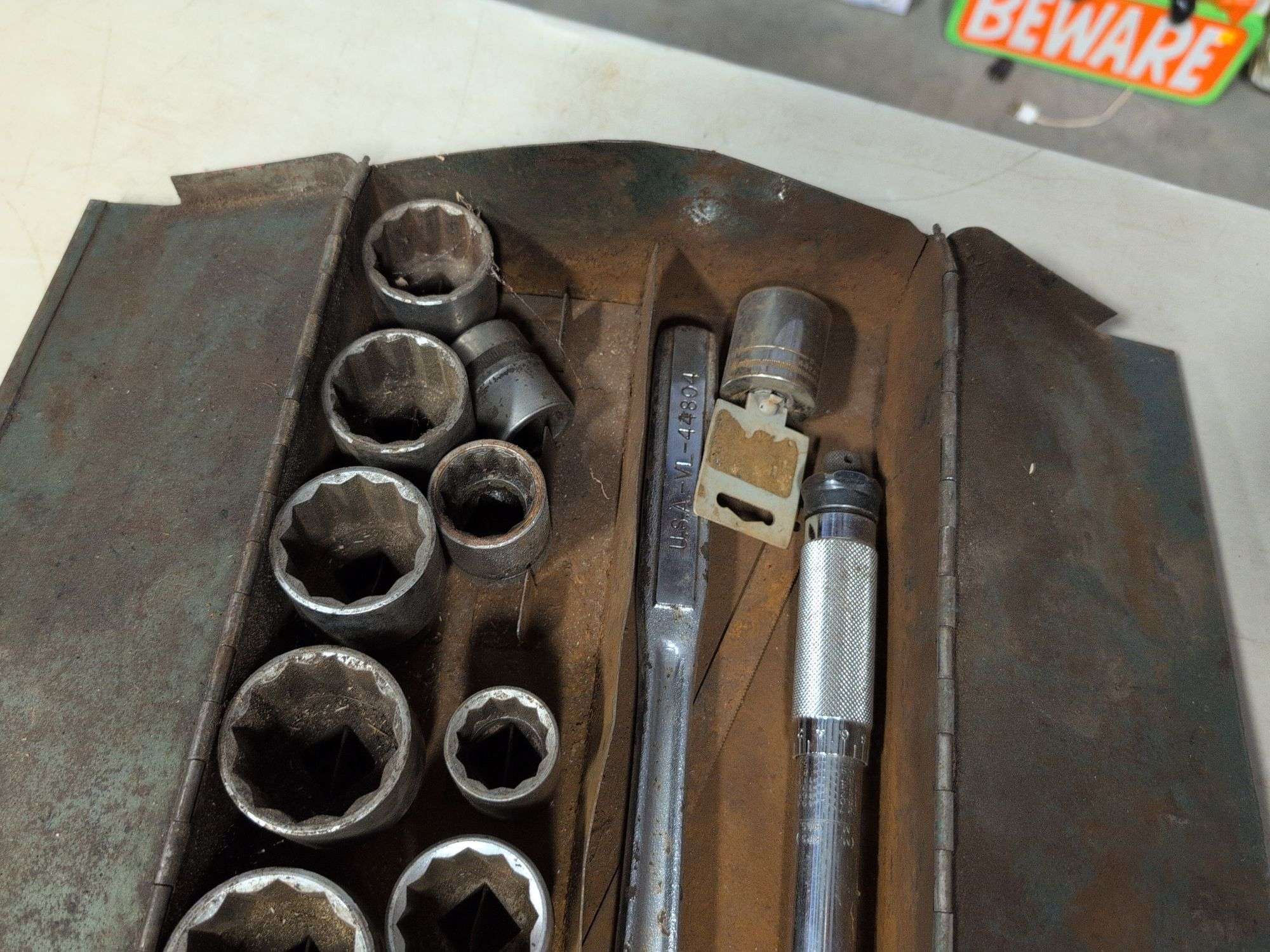 Metal toolbox with large ratchets and sockets