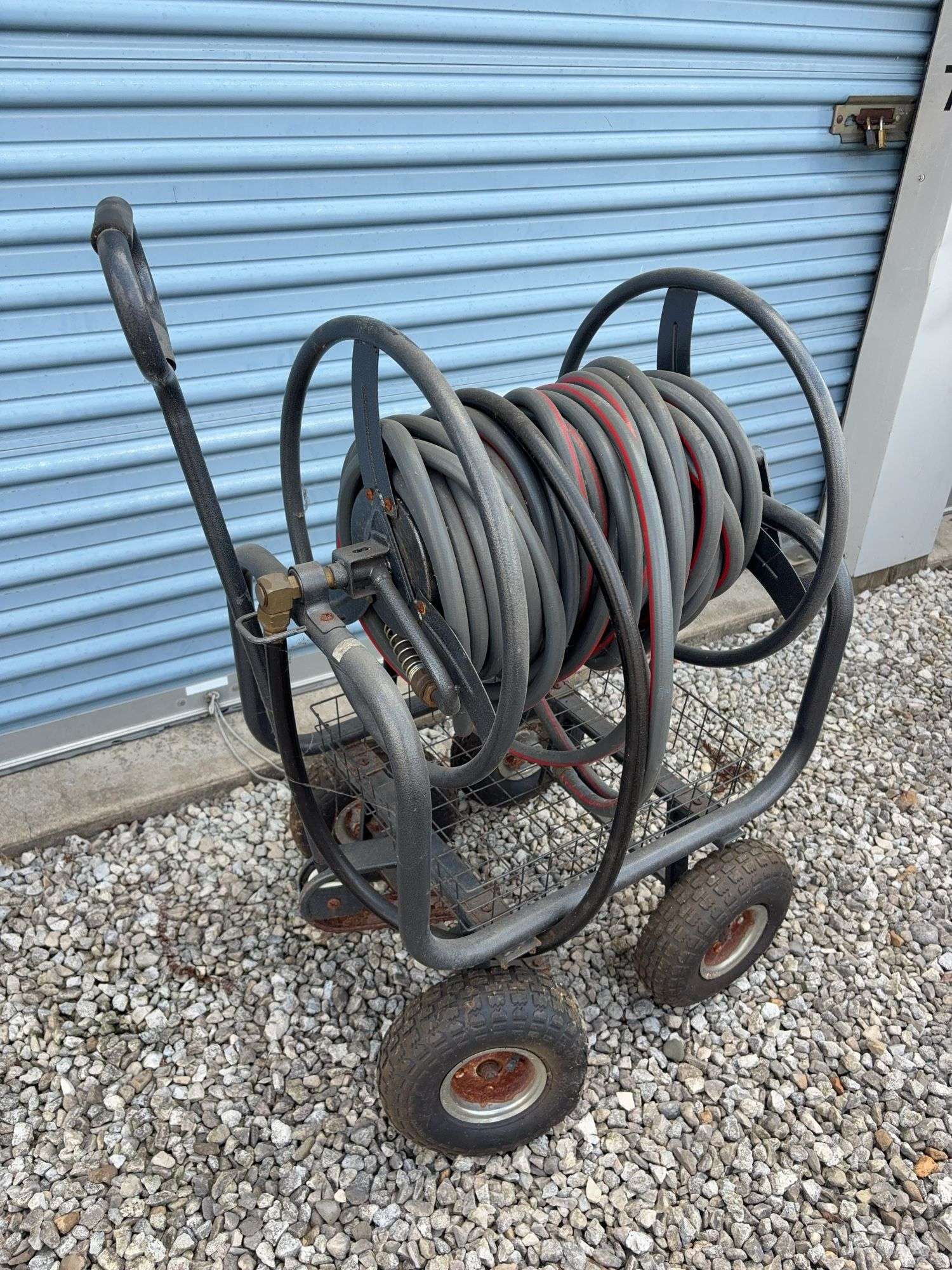 Garden hose with cart - most wheels are flat