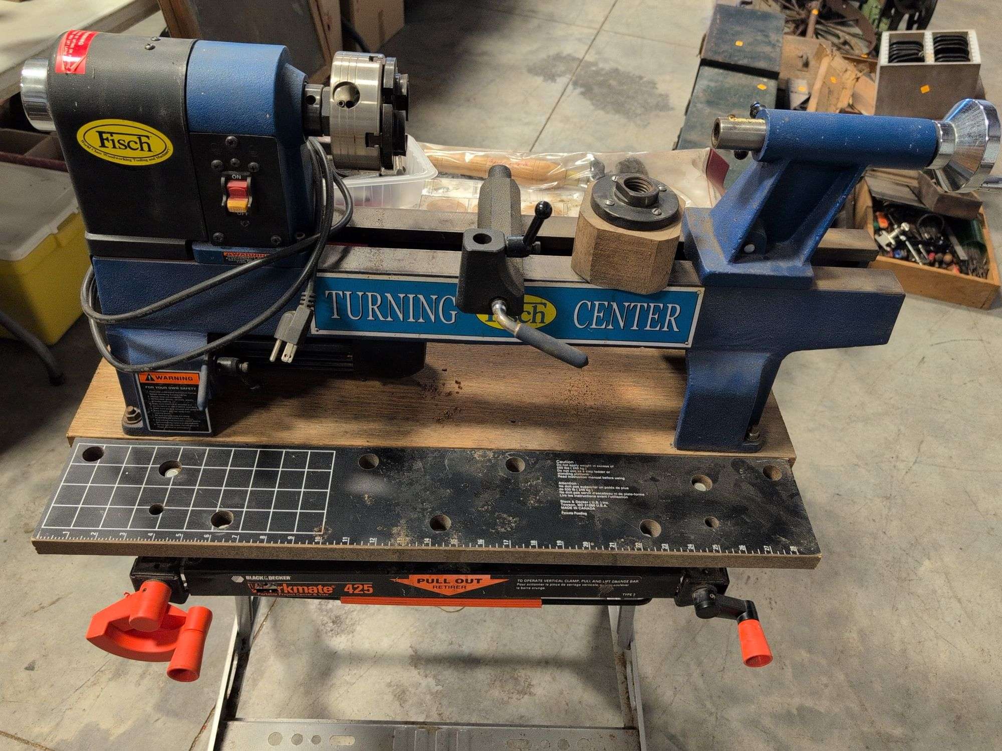 Fisch wood lathe machine, Black and Decker workmate, lathe bits, and woodworking tools