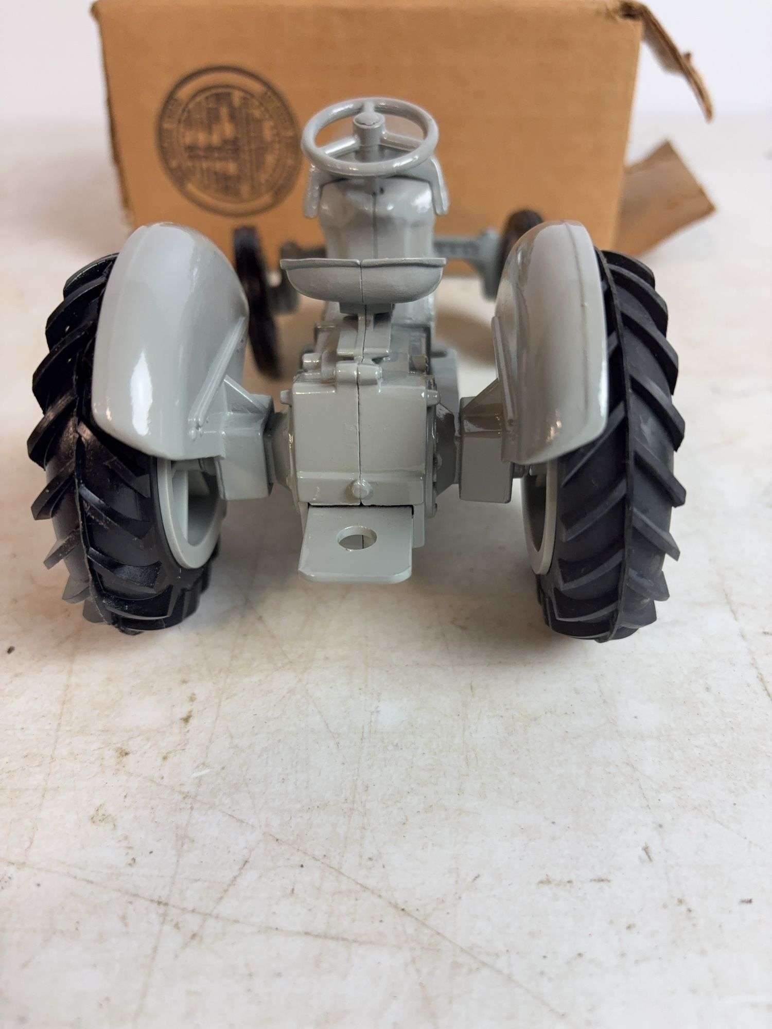 Ford 8N die-cast model tractor with Dearborn plow and other Ford tractor - 1/16 scale, dirty