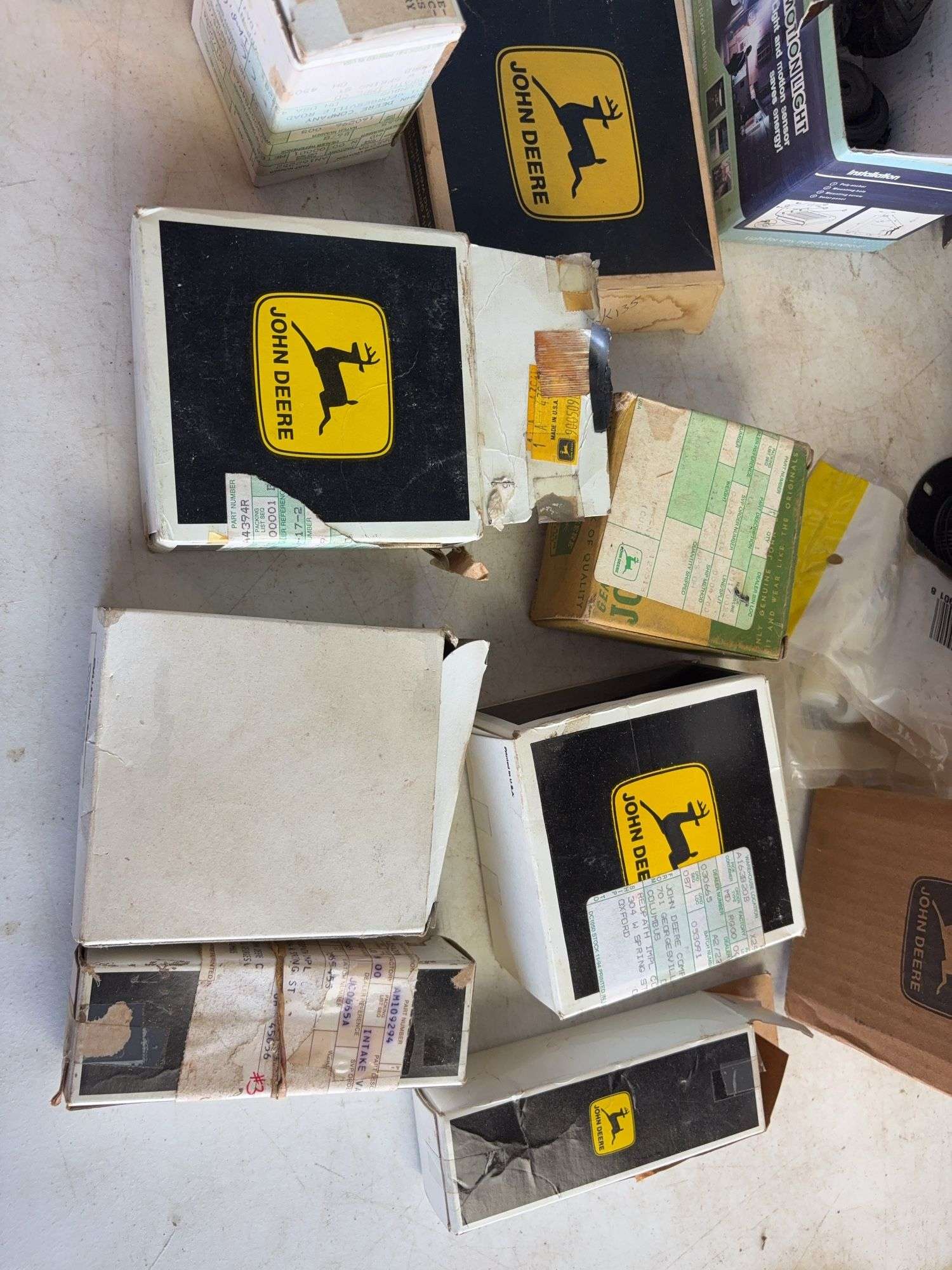 Tote of filters, parts, and more - John Deere, Wix, etc