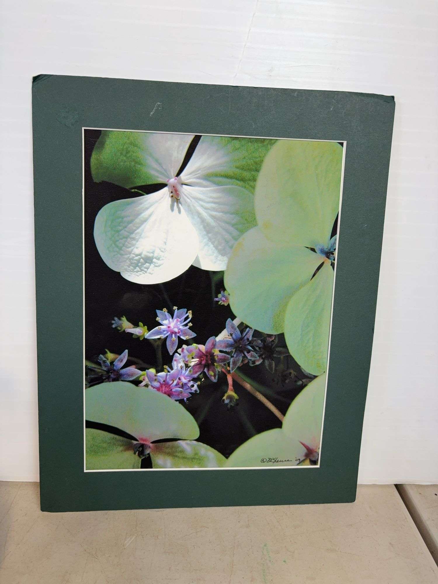 Vases with silk flowers, cups, and more